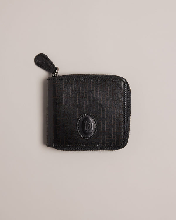 TOBIAT-Wallets-Take your style from casual to elevated with TOBIAT. With a zip-around fastening, inside pocket and multiple card slots, you’ll be able to hold on to all your essentials with ease.By purchasing this product, you are supporting responsible leather manufacturing through the Leather Working Group. Wallet Leather T monogram texture Zip around fastening Card slots Inside pocket Ted Baker branded embellishment Dimensions: 2cm x 9cm x 11cm- Ted Baker Romania